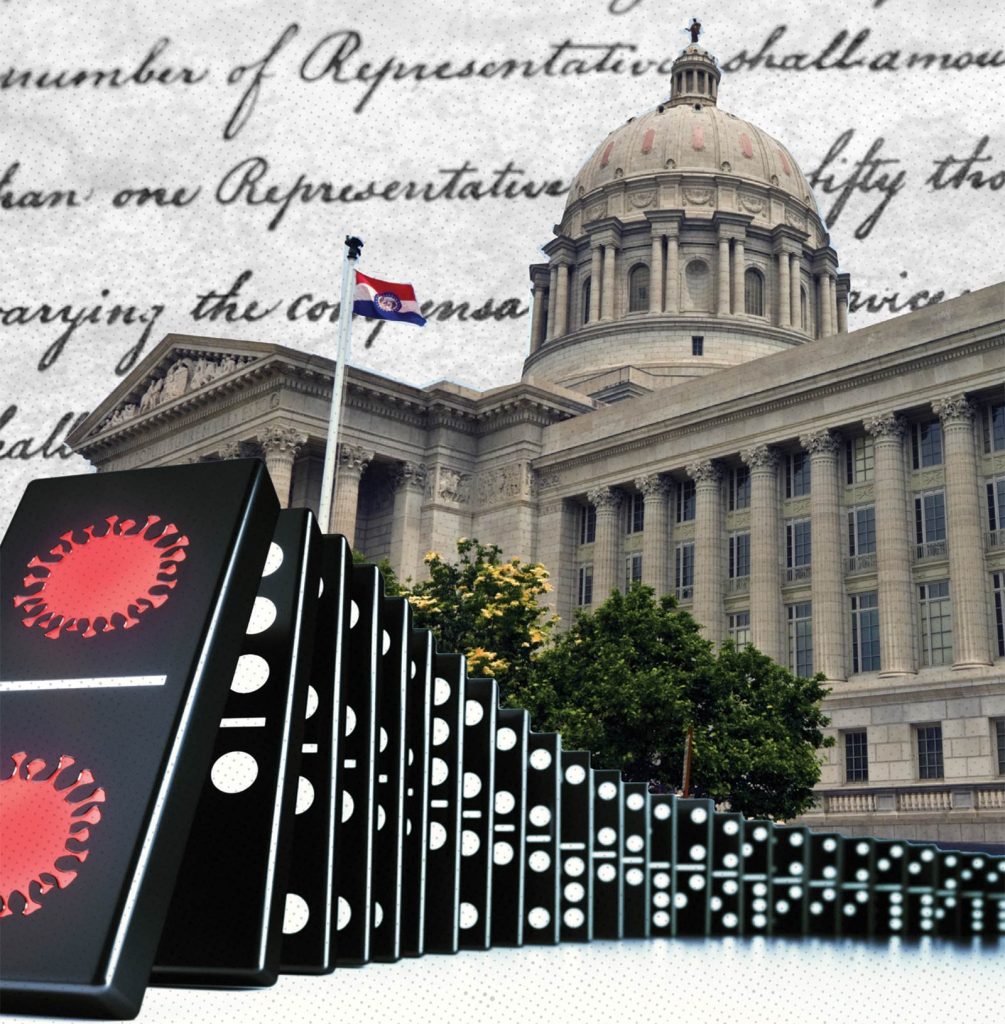 oversized dominoes with coronavirus symbols on them are lined up