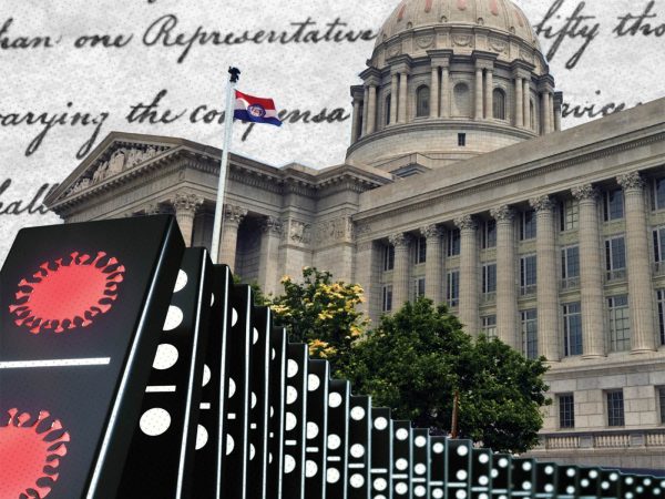 oversized dominoes with coronavirus symbols on them are lined up