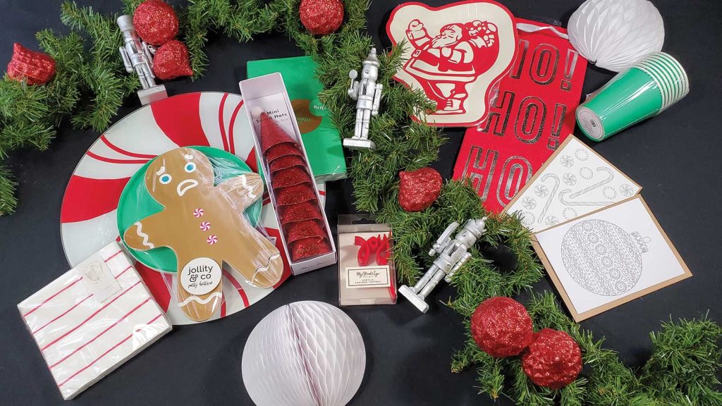 flat lay of Christmas holiday party supplies in green and red colors