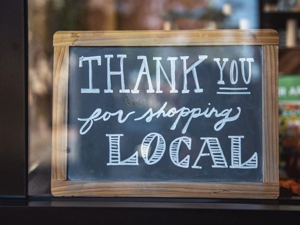 thank you sign in local store window Tim Mossholder Qvwngmotbik Unsplash