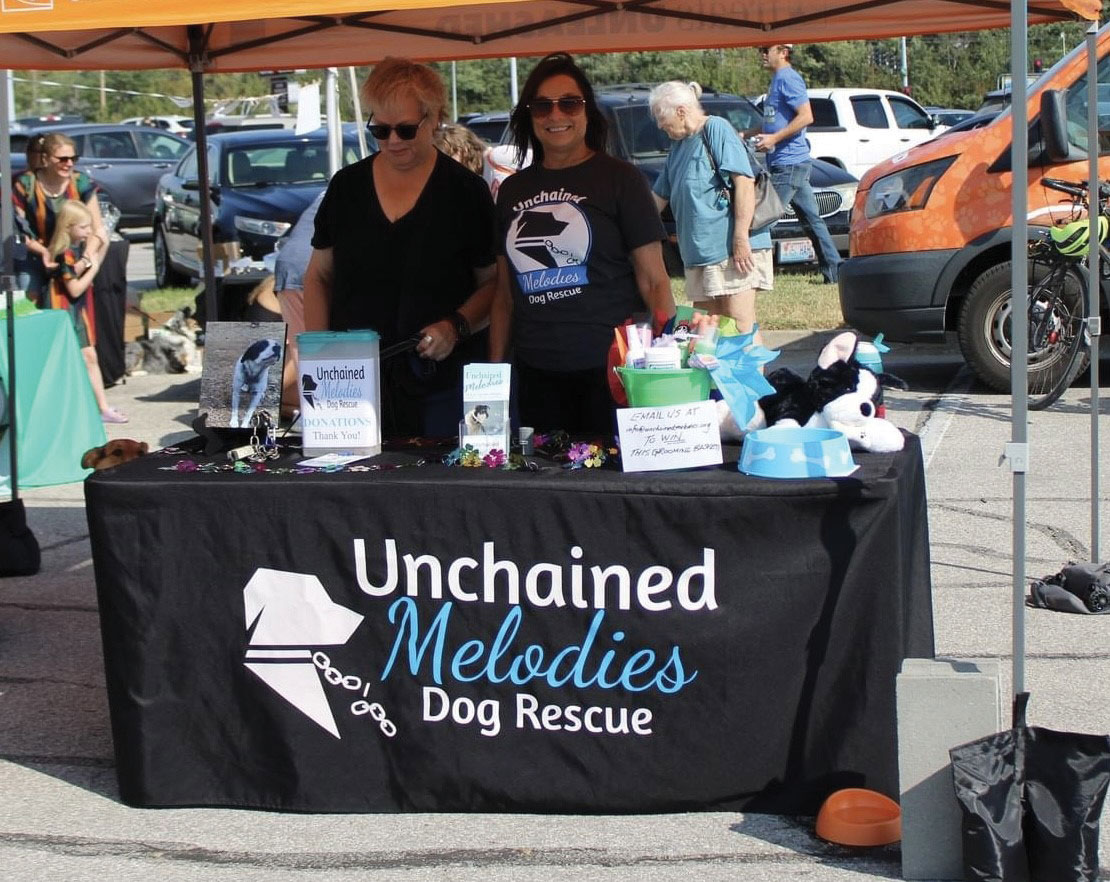 Unchained Melodies Volunteer Booth
