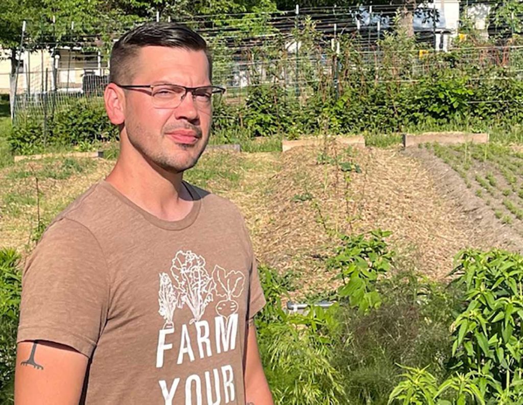 manager of the Columbia Urban Veterans Farm|Army veteran Erich Wilson at the Columbia Urban Veterans Farm|Como Extra Oats transit bus parked outside the Columbia Regional Airport|The logo for the State Historical Society of Missouri