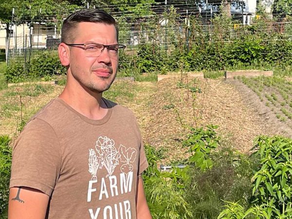 manager of the Columbia Urban Veterans Farm|Army veteran Erich Wilson at the Columbia Urban Veterans Farm|Como Extra Oats transit bus parked outside the Columbia Regional Airport|The logo for the State Historical Society of Missouri