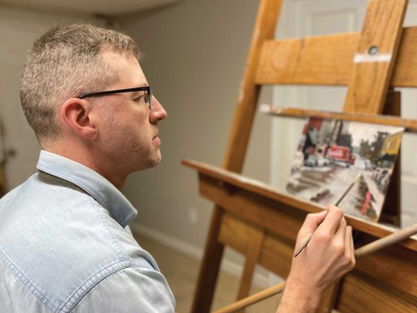 Derek-B-Fox-painting-at-his-easel