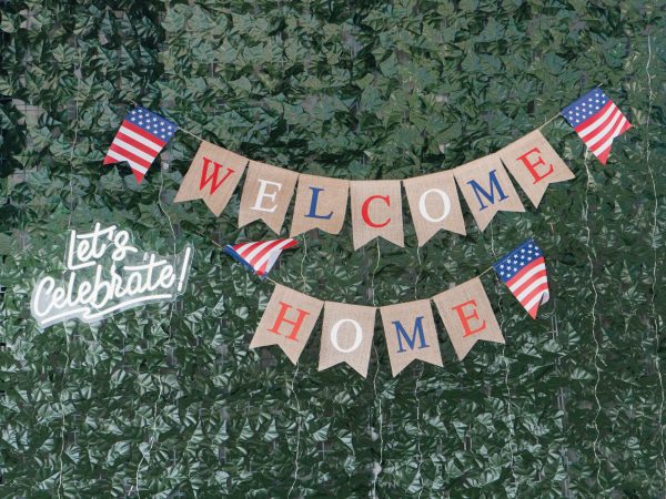 Ivy-Wall-with-Welcome-Home-Banner-and-neon-sign