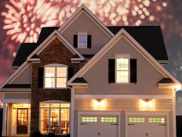 computer-generated-image-of-a-house-with-fireworks-in-the-background