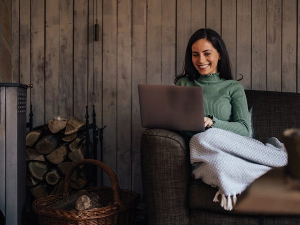 Featured Woman Writing A Novel In A Cabin