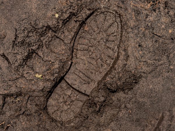 featured-work-boot-print-in-mud