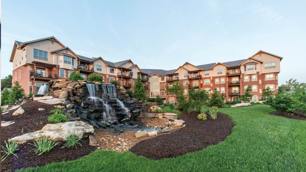 featuring wood and brick accents. In front