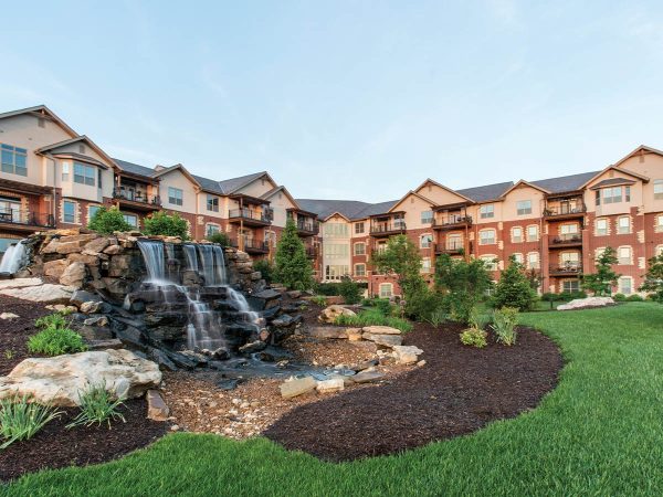 featuring wood and brick accents. In front