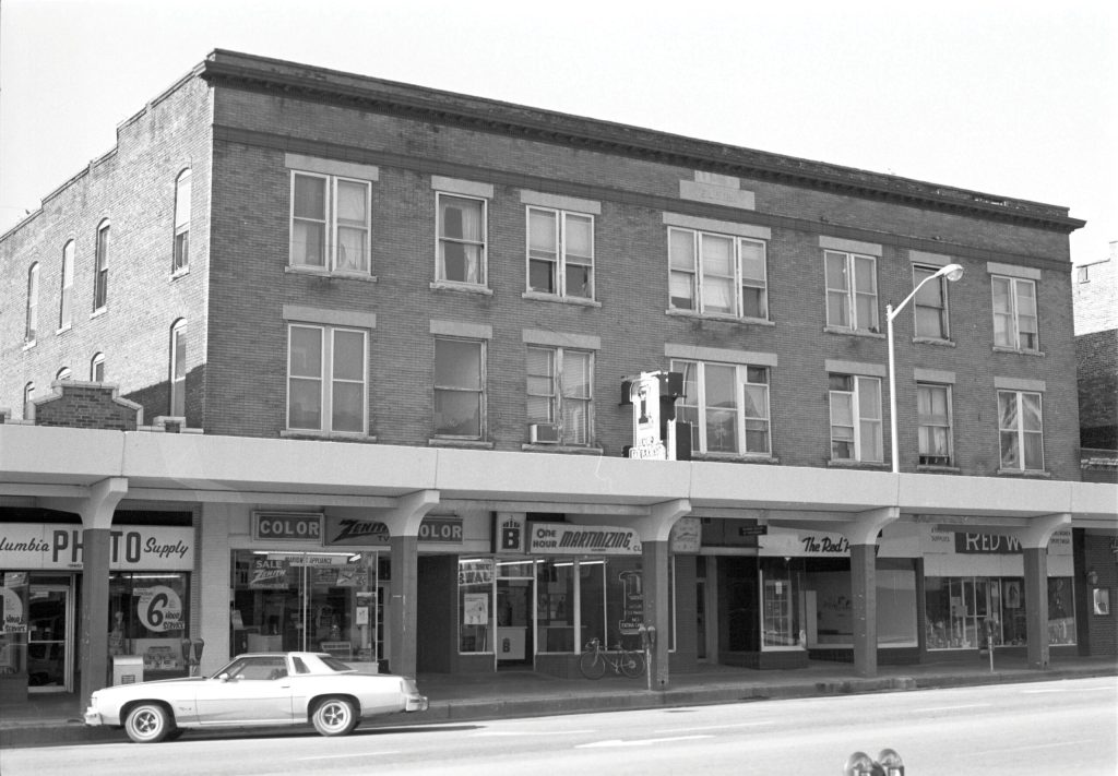 Missouri|historical black and white image of President at Ronald Reagan Hickman HighSchool|black and white historical image of a brick building on South Ninth Street in Columbia