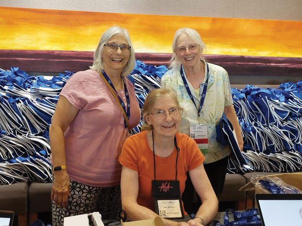 Susan Burpo stand while Jean Williams is seated.|Columbia Spinners Guild: Debbie Wilson|Columbia Spinners Guild