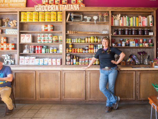 shelly-la-fata-standing-against-shelves