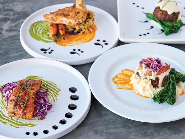 spread-of-entrees-from-eclipse-catering-featured-image
