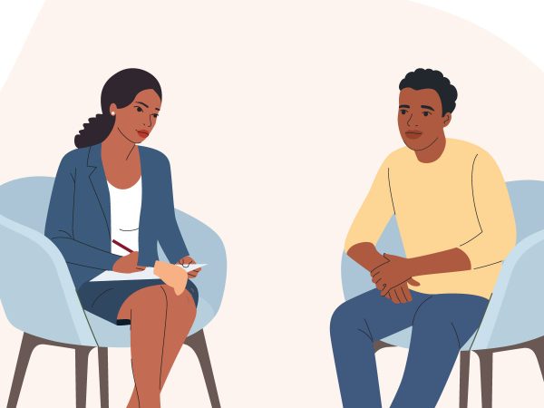 therapist-and-client-sitting-in-matching-chairs