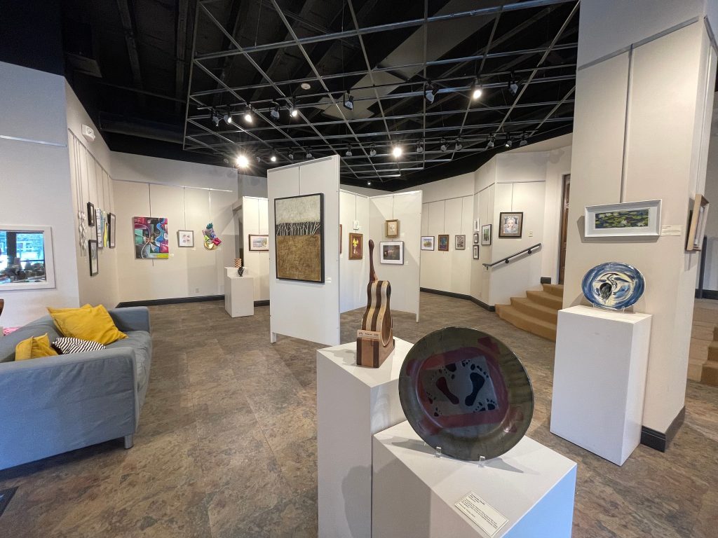 The interior of Columbia Art League, showing a recent art exhibit.