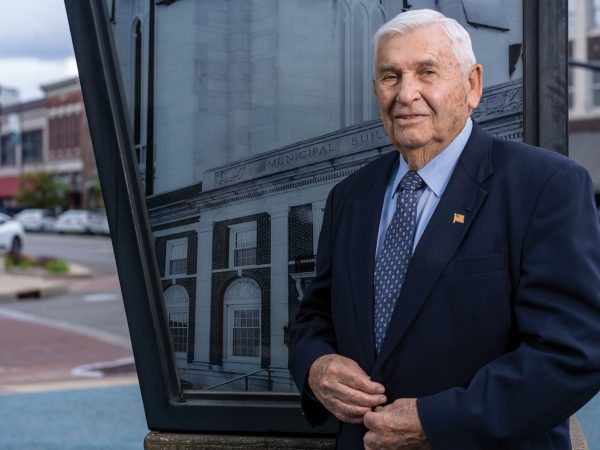 featured-ray-beck-standing-in-front-of-columbia-keyhole-outside-of-city-hall
