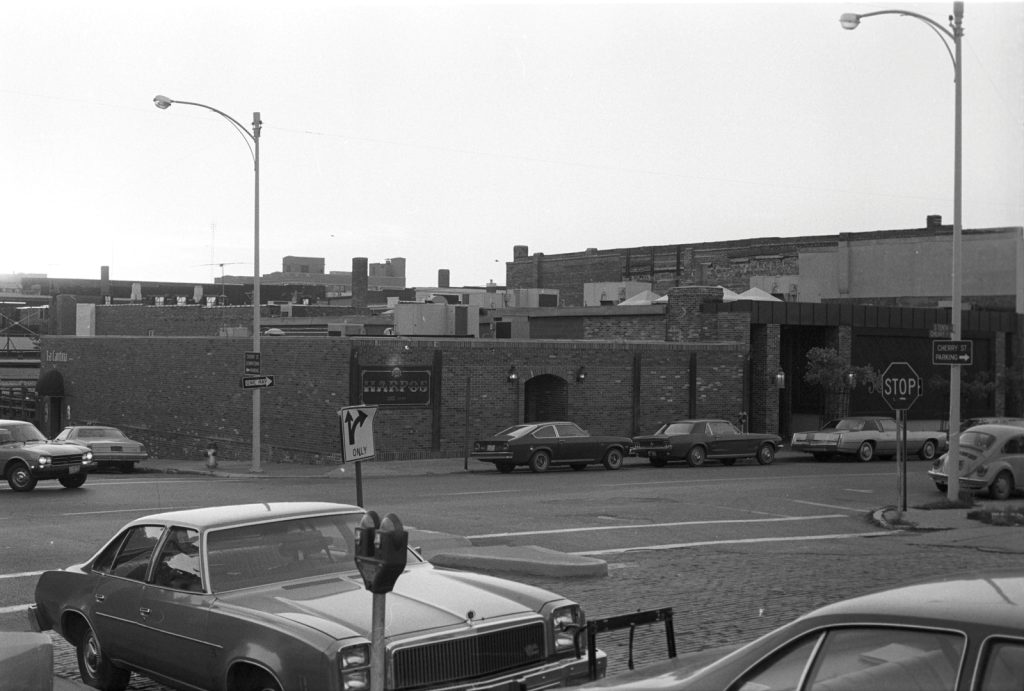 Old, black and white photo of the outside of the historic Harpo's in downtown Columbia, MO