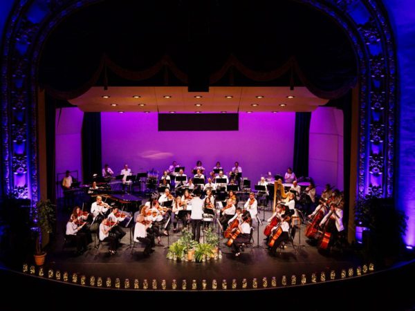 The Missouri Symphony performs at the historic Missouri Theatre.