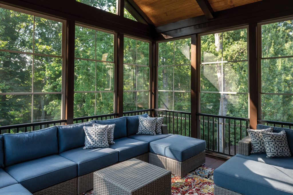 sunroom-with-blue-wicker-sofa
