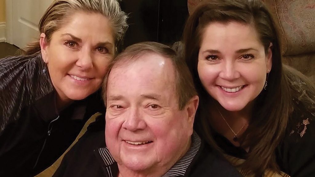 Sisters Amy Gross Greenwood and Rebecca Gross-Highland with their father, Larry Gross.