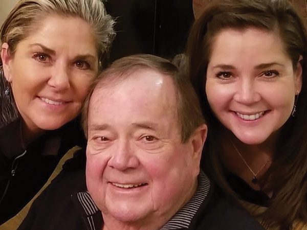 Sisters Amy Gross Greenwood and Rebecca Gross-Highland with their father, Larry Gross.