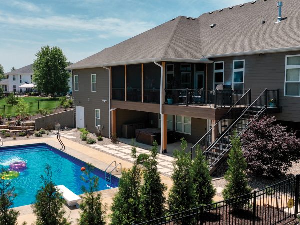 exterior of a house with a deck and pool