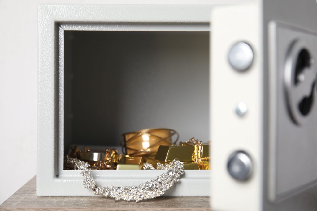 valuable-jewelry-being-locked-away-in-a-safe