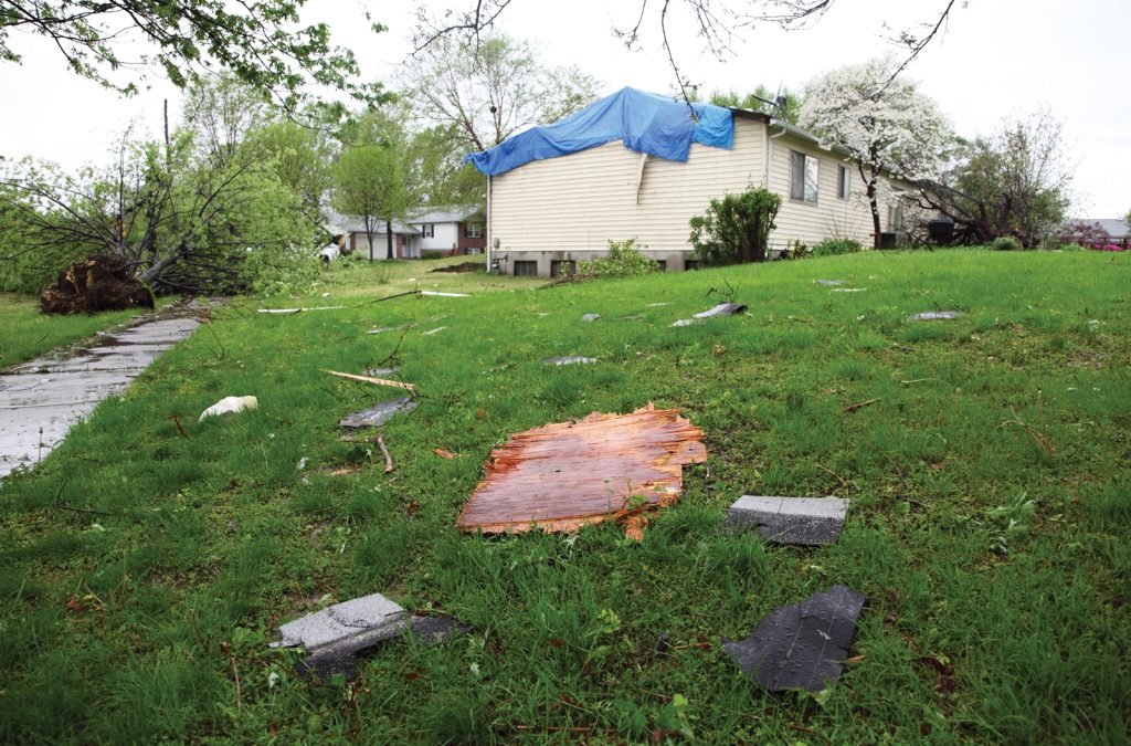 debris-in-yard-after-a-severe-storm