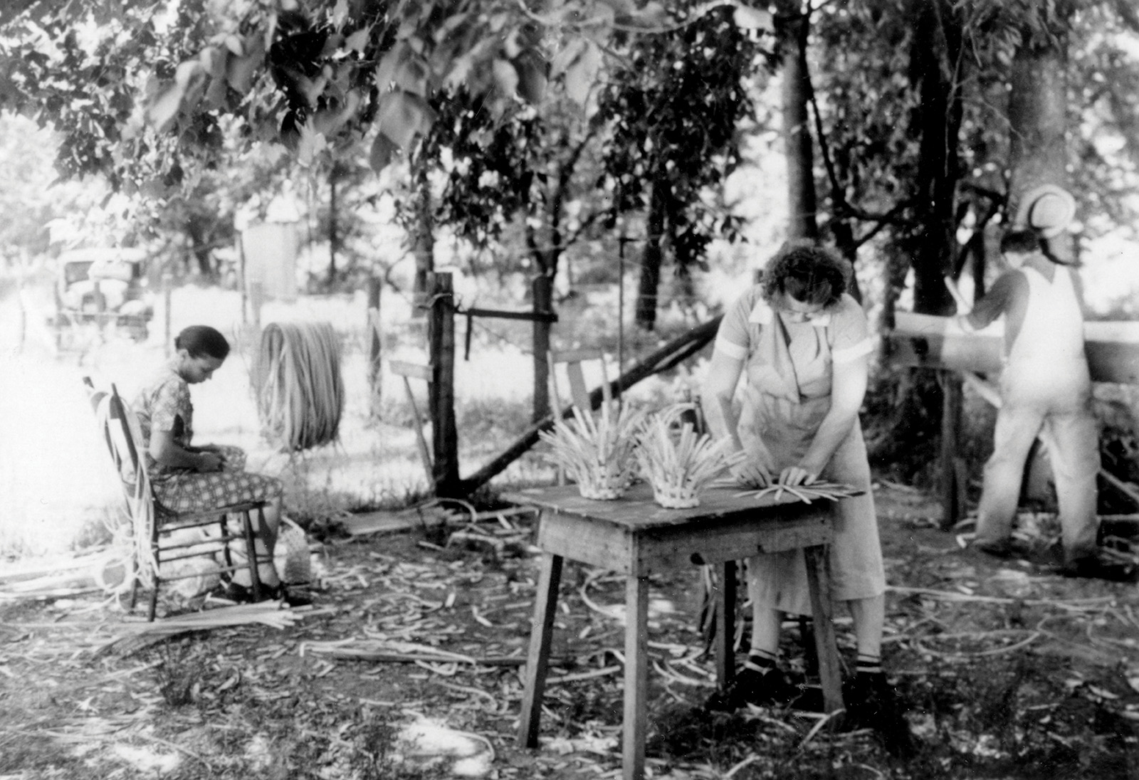 Basketville women weaving