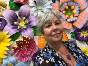 A colorful portrait photo of Columbia, Mo., artist Lisa Bramlett.