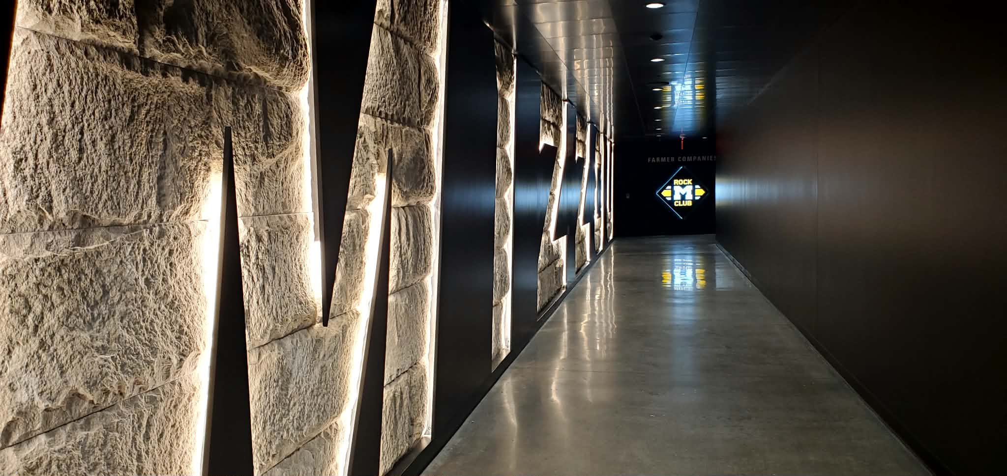 The corridor leading to the Rock M Club is a modern take on the traditional amenities of the 100-year-old Memorial Stadium.